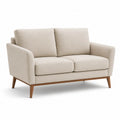 Canapé deux places tissu polyester beige pieds en bois massif